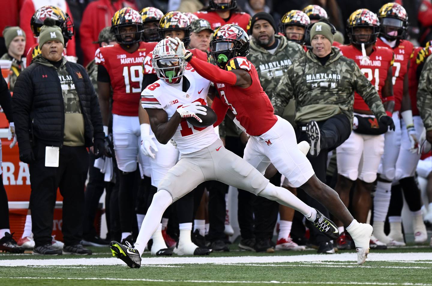 COLLEGE PARK, MARYLAND - NOVEMBER 19: Marvin Harrison Jr. #18 of the Ohio State Buckeyes makes a catch in the first quarter against Deonte Banks #3 of the Maryland Terrapins at SECU Stadium on November 19, 2022 in College Park, Maryland.