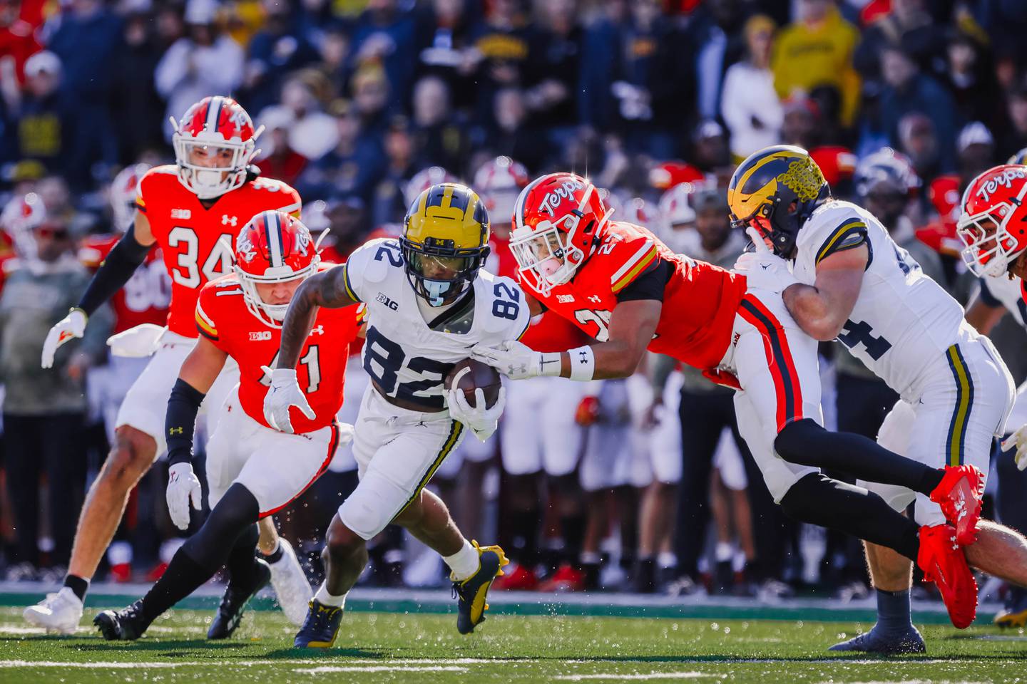 BB-SP-Maryland-Michigan #27, Caleb Atogho, landing a tackle on Michigan in the First play of the game