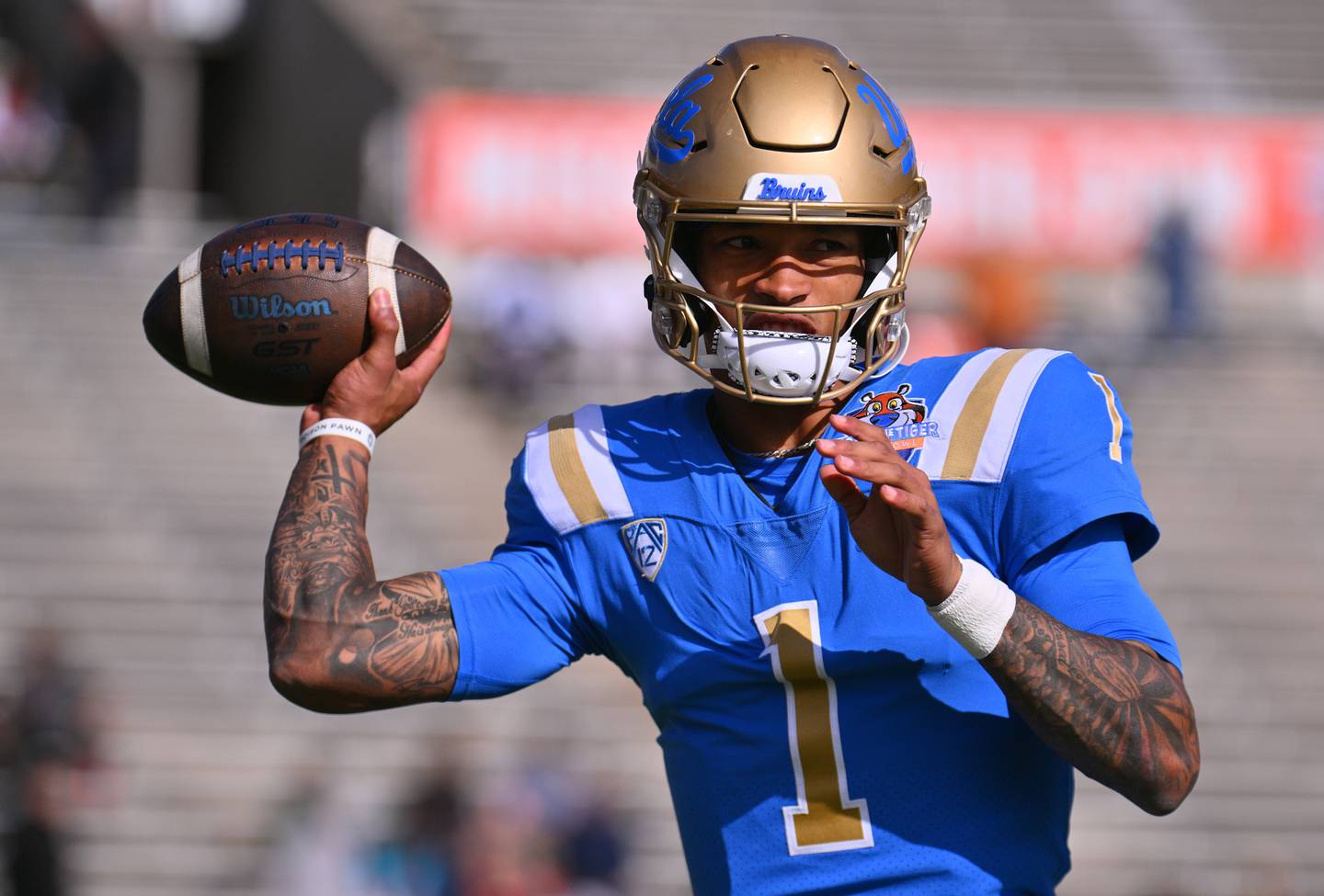 Quarterback Dorian Thompson-Robinson #1 of the UCLA Bruins warms up before his team's game against the Pittsburgh Panthers in the Tony the Tiger Sun Bowl game at Sun Bowl Stadium on December 30, 2022 in El Paso, Texas.