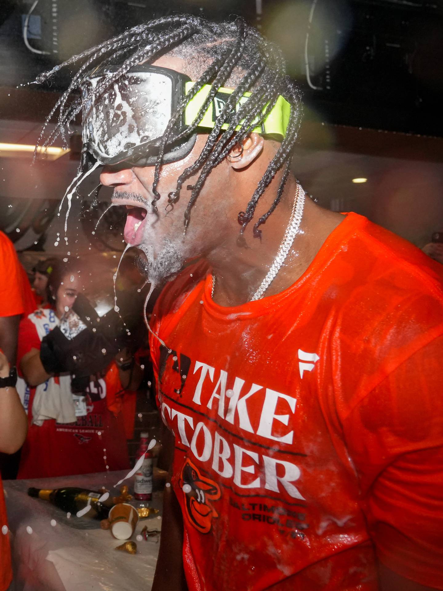 Baltimore Orioles right fielder Heston Kjerstad (13) is sprayed with champagne by teammates in the clubhouse following their playoff-clinching win against the Tampa Bay Rays on Sunday, September 17, 2023. The Orioles earned a spot in the playoffs for the first time since 2016.