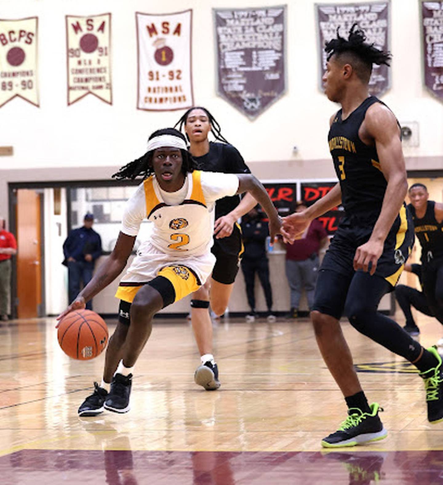 Dunbar's Otis Toney drives down the lane during Friday's boys basketball match against Randallstown. Toney finished with 21 points and seven rebounds for game's Most Valuable Player honors as the Poets improved to 12-2 with a 67-49 victory over the Rams in the opening game of the 25th Basketball Academy at Dunbar.