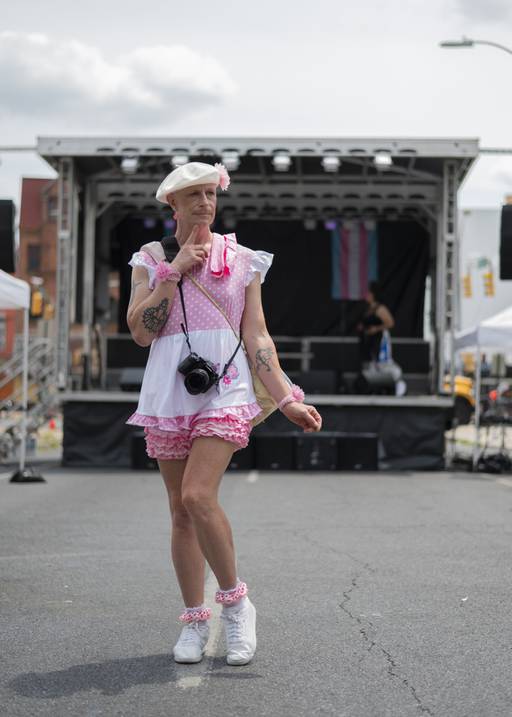 Bennie poses to show of his outfit during Trans Pride in Baltimore on June 3, 2023.