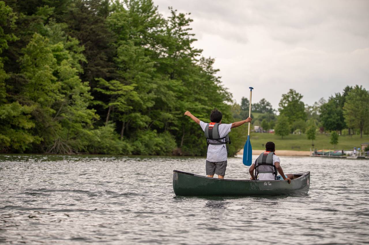 Two youths from GRYC pause to admire the scenery during a two hour canoe trip on Lake Habeeb on Saturday May 20, 2023.
