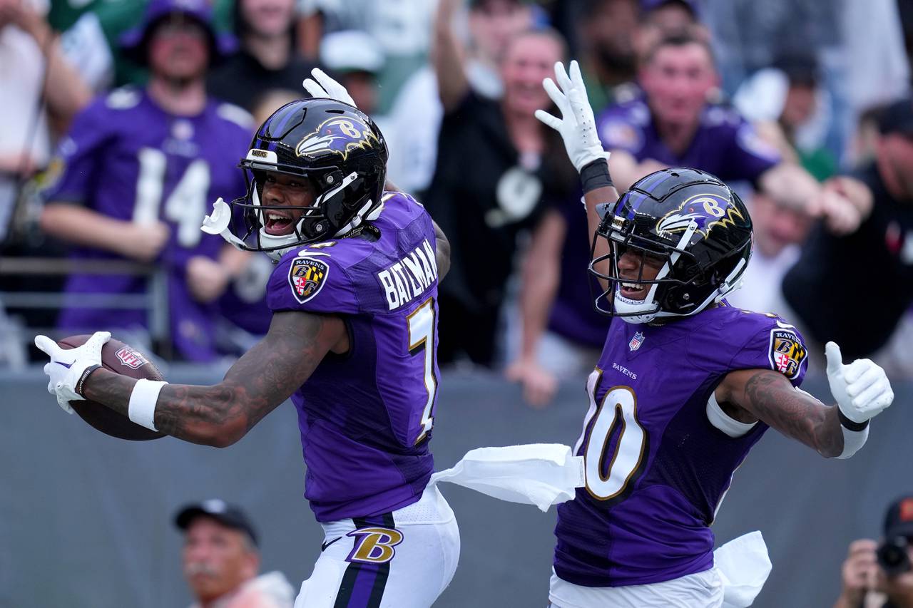 Rashod Bateman #7 of the Baltimore Ravens celebrates a touchdown alongside Demarcus Robinson #10 of the Baltimore Ravens in the third quarter of the game at MetLife Stadium on September 11, 2022 in East Rutherford, New Jersey.