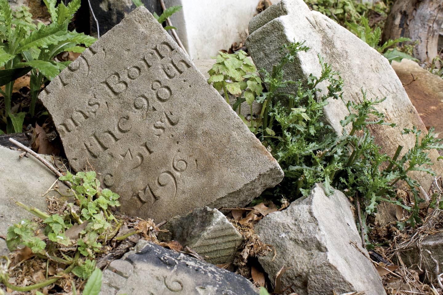 Broken gravestones at Old Saint Paul’s Cemetery in Baltimore City.