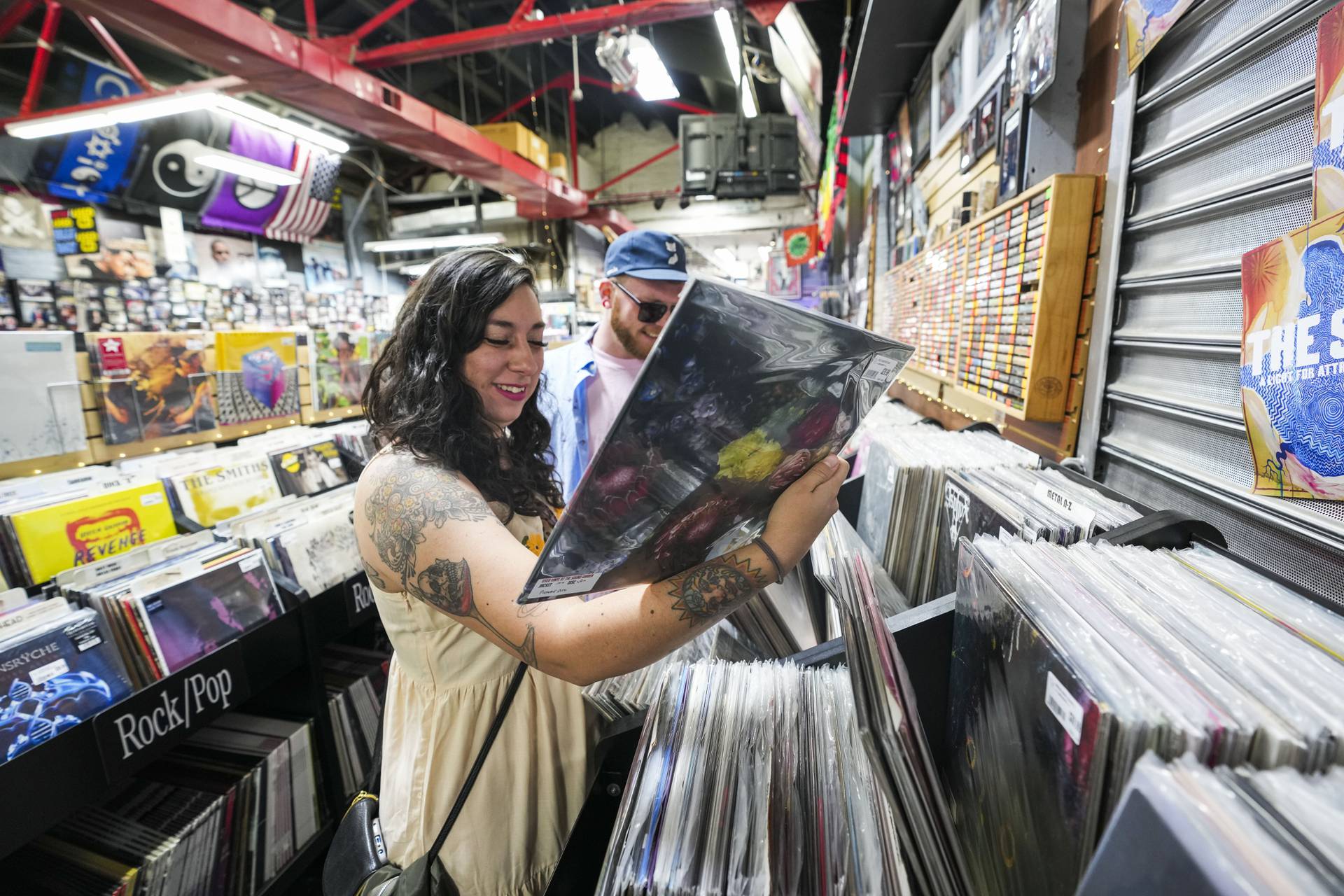 DJ Dagm Endalkachew browses for records at Soundgarden a few days before Record Store Day on April 19, 2023.