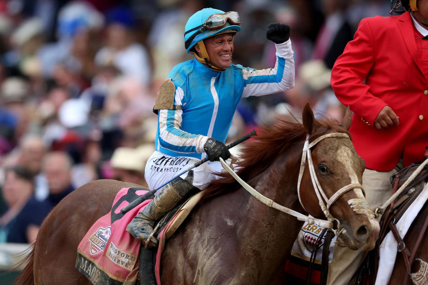 LOUISVILLE, KENTUCKY - MAY 06: Jockey Javier Castellano celebrates atop of Mage #8 after winning t the 149th Kentucky Derby at Churchill Downs on May 06, 2023 in Louisville, Kentucky.