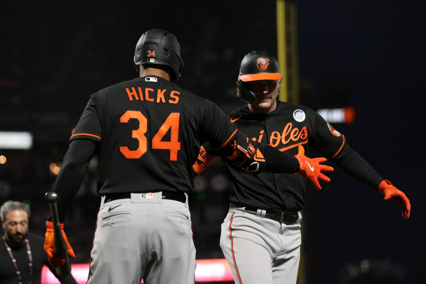 SAN FRANCISCO, CALIFORNIA - JUNE 02: Gunnar Henderson #2 of the Baltimore Orioles is congratulated by Aaron Hicks #34 after he hit a home run against the San Francisco Giants in the seventh inning on June 02, 2023 in San Francisco, California.