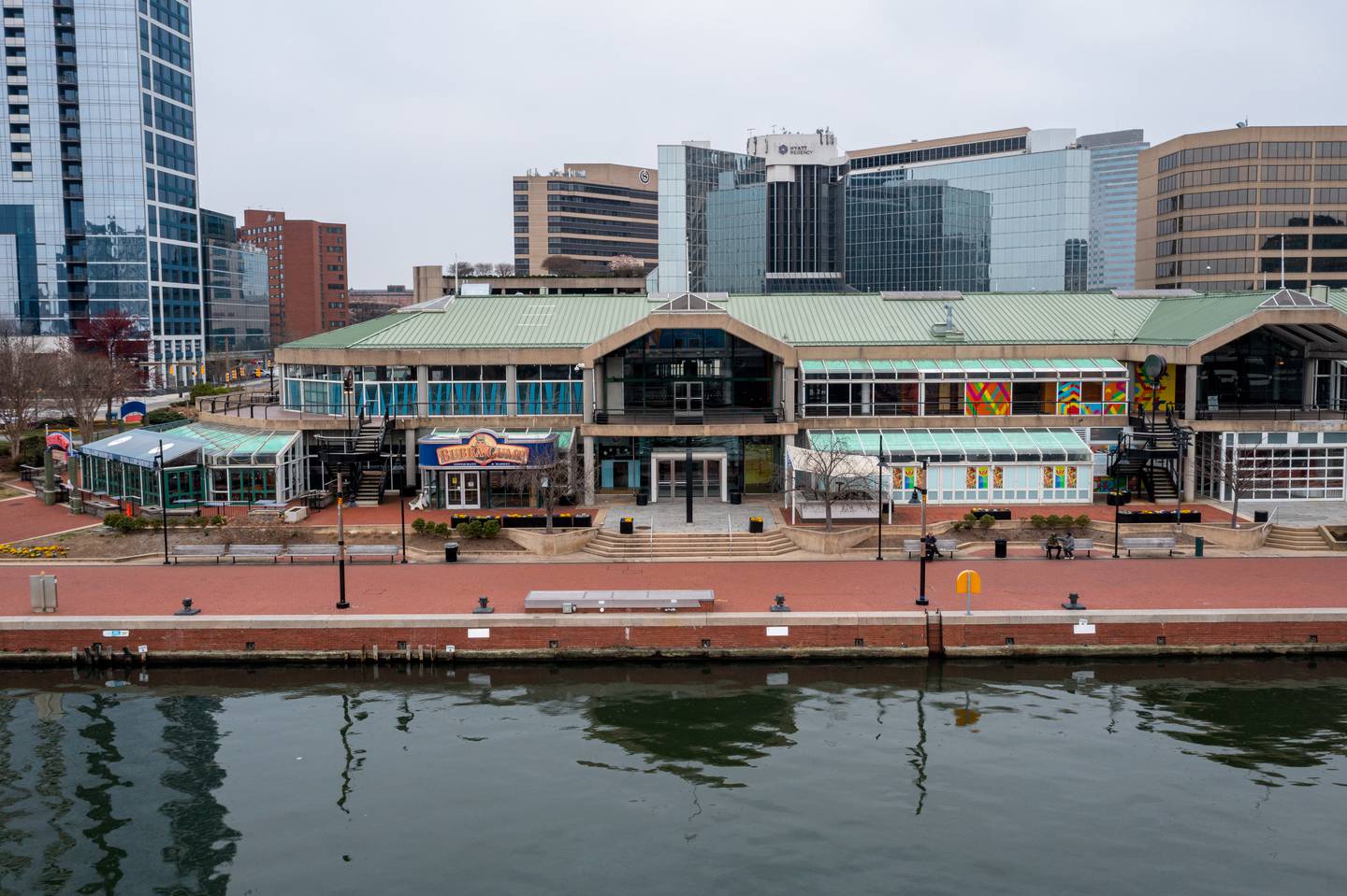 A view of Baltimore's Inner Harbor taken with a drone on Friday, March 17. Several property and business owners say they have concerns about the low levels of foot traffic in the district, which they need to stay in business.