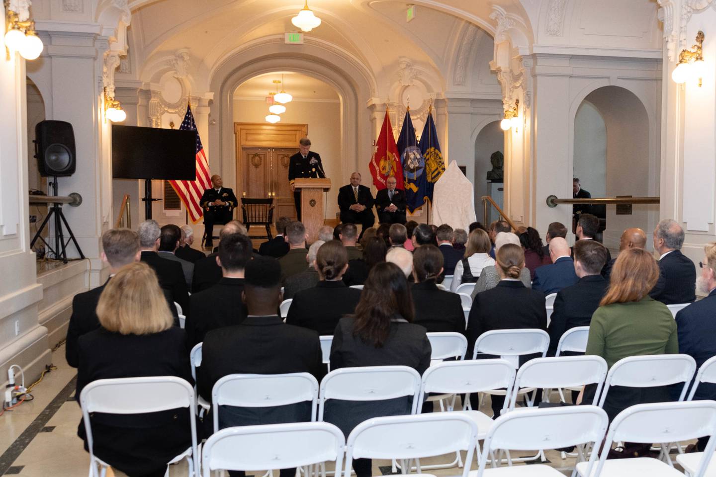 Superintendent Vice Adm. Sean Buck delivers remarks during a renaming ceremony held in Mahan Hall at the U.S. Naval Academy.