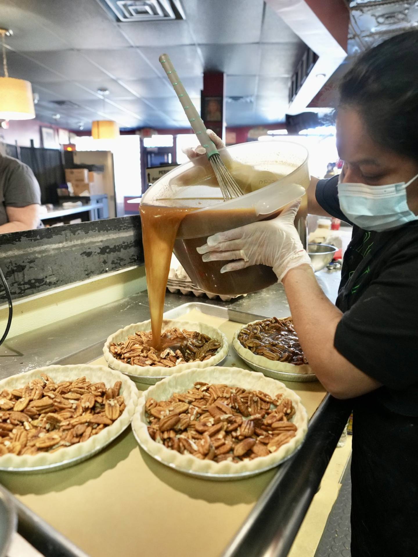 Pie crust gets perfected a the popular pie shop at Dangerously Delicious. (Kaitlin Newman / The Baltimore Banner)