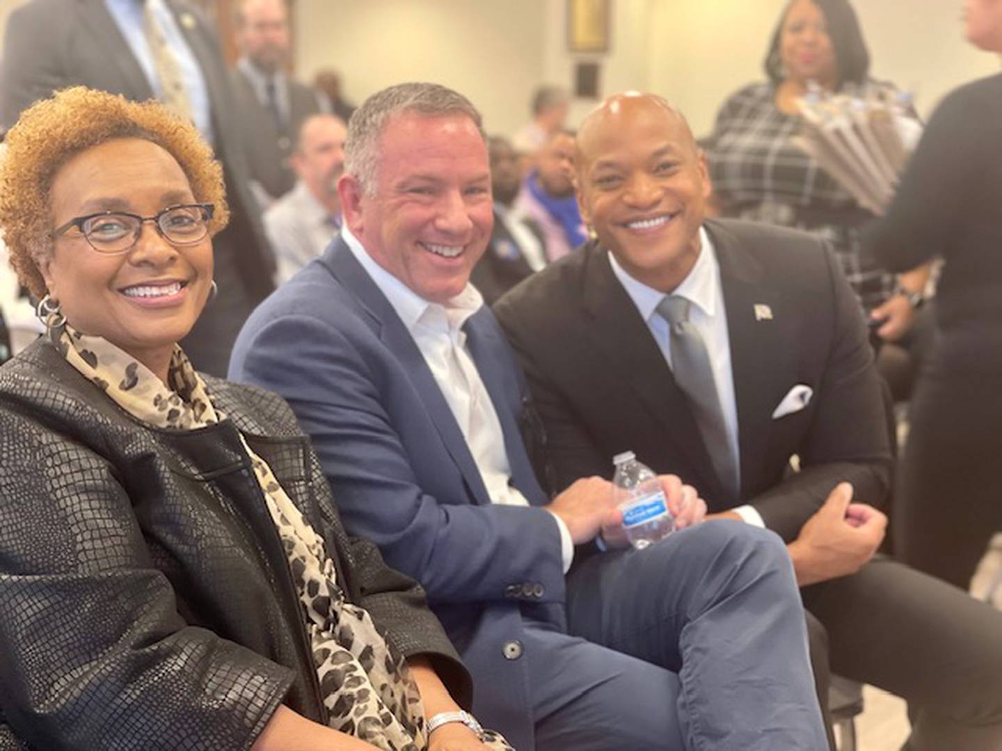 The new leaders of the Maryland Democratic Party, First Vice Chair Charlene Dukes, left, and Chair Ken Ulman, center, are joined by Gov. Wes Moore at the party's election on Saturday, Nov. 18, 2023 at a union hall in Prince George's County.