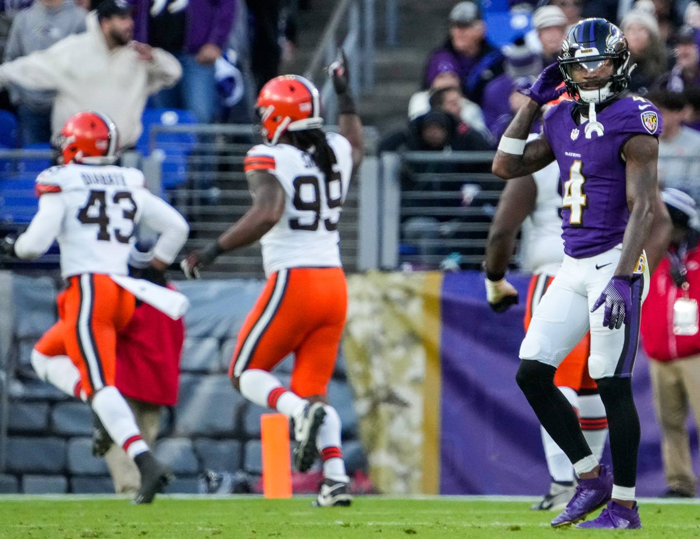 Baltimore Ravens wide receiver Zay Flowers (4) walks away as the Cleveland Browns celebrate cornerback Greg Newsome II’s touchdown during the fourth quarter at M&T Bank Stadium on Sunday, Nov. 12, 2023.