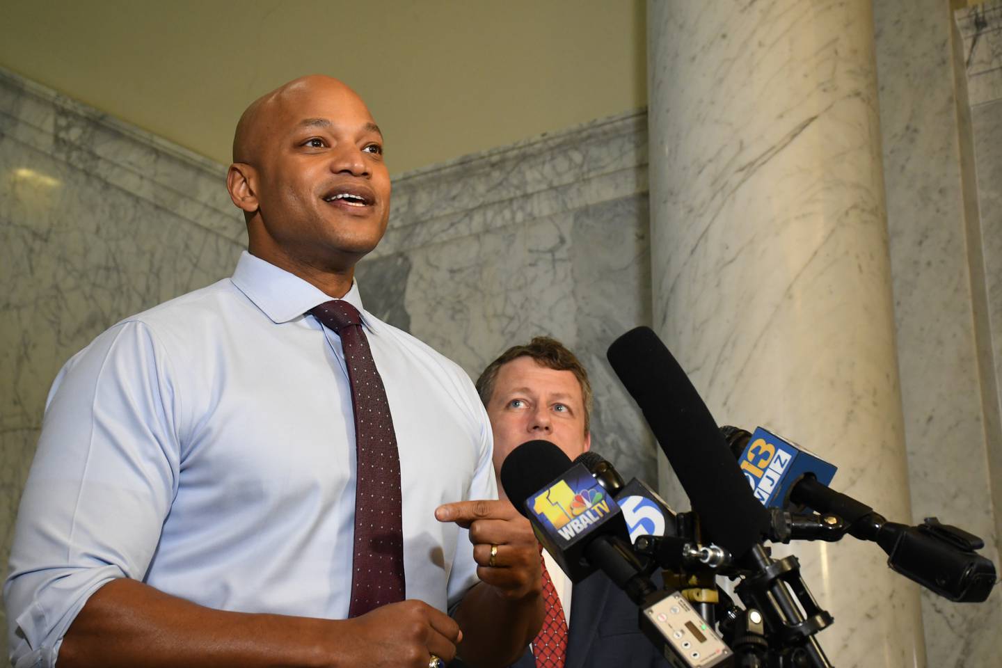 Maryland Gov. Wes Moore speaks with reporters on March 20, 2023 about his legislative agenda at the State House on “crossover” day, the deadline for bills to pass at least one chamber of the Maryland General Assembly to have the best chance of passage. He’s joined by his chief legislative officer, Eric Luedtke.