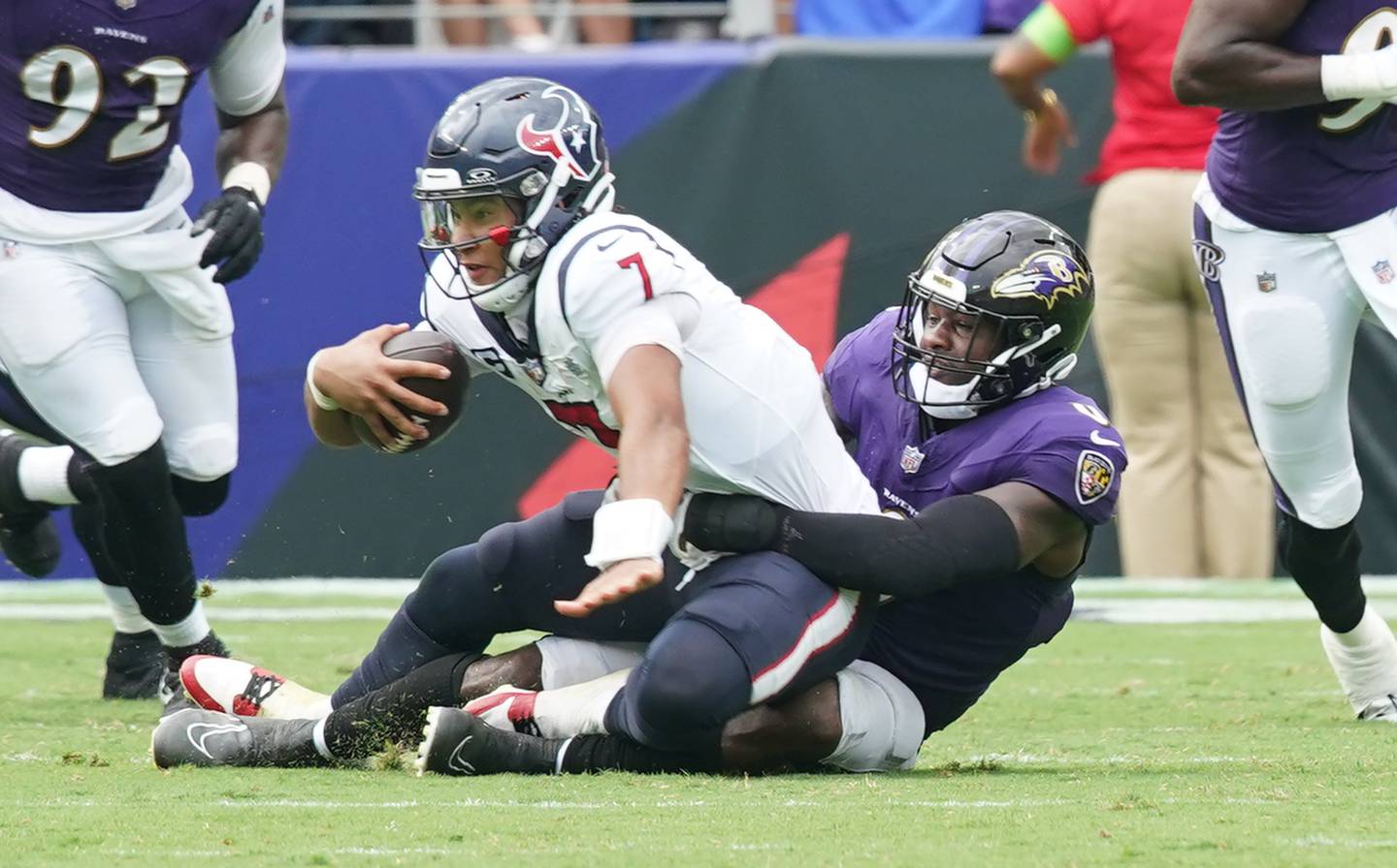 Baltimore Ravens linebacker Roquan Smith (0) sacks Texans’ quarterback  C.J. Stout in the 3rd quarter in the Ravens 25-9-victory at the M&T Stadium Sept. 10, 2023.