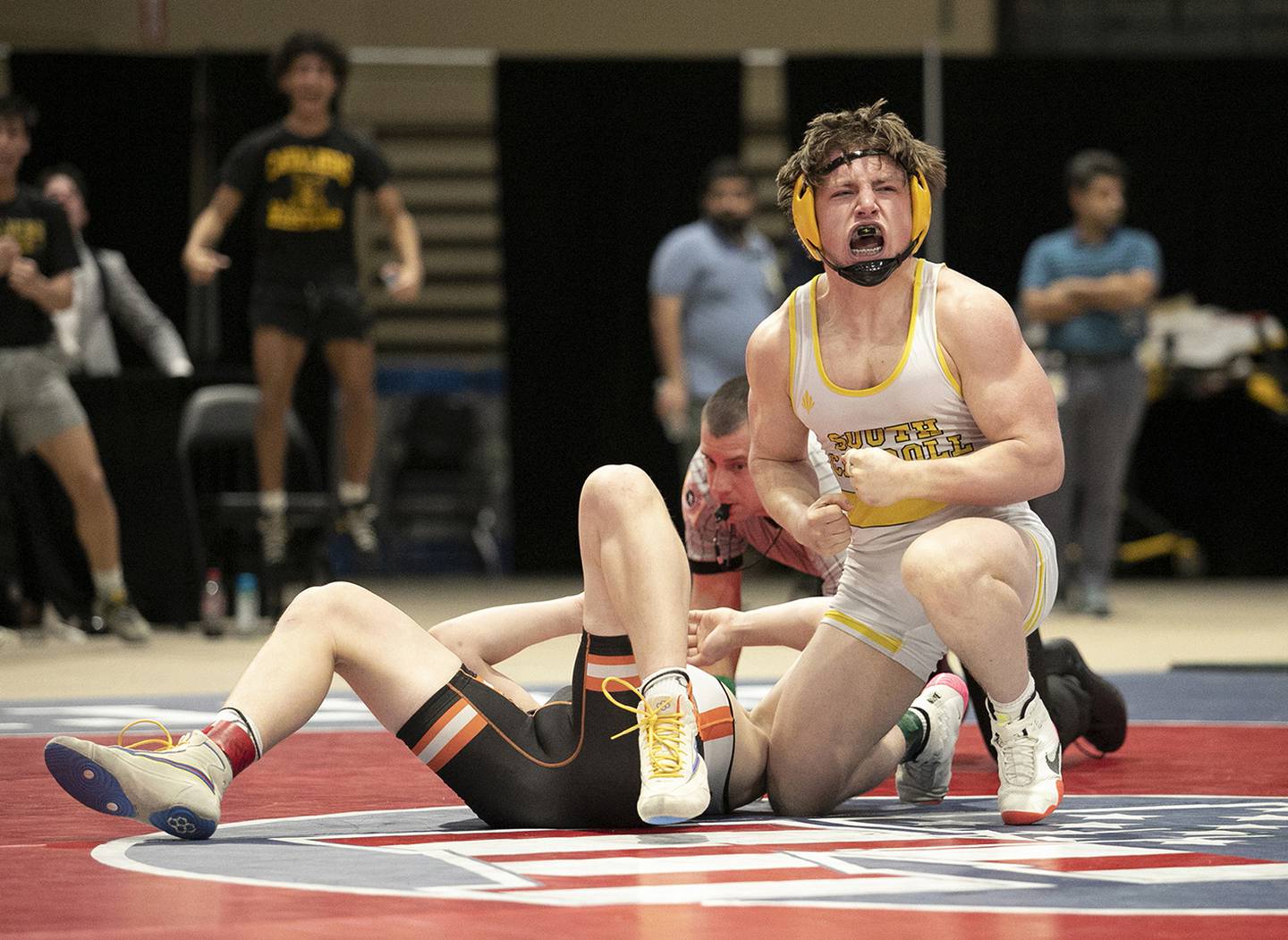 South Carroll's 182-pound senior Rylan Moose (facing, right) pinned 182-pound rival and junior Mason Testerman (left) of Rising Sun for his Class 2A-1A state title on Saturday at Show Place Arena in Upper Marlboro.