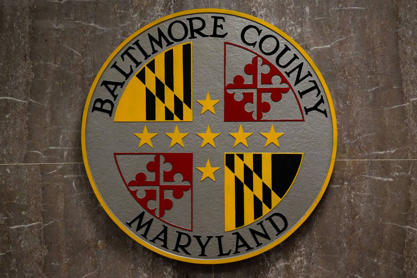 6/16/22—A sign reading “Baltimore County Maryland” hangs on the wall inside the historic Baltimore County Courthouse in Towson, the center of county government.