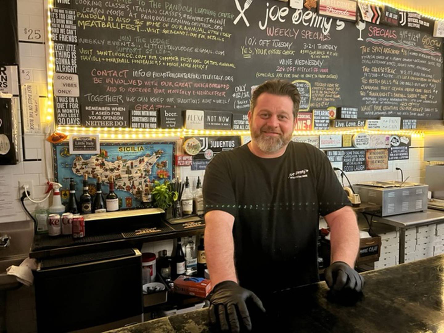 Joe Benny’s chef and owner Joseph Gardella stands behind the bar.