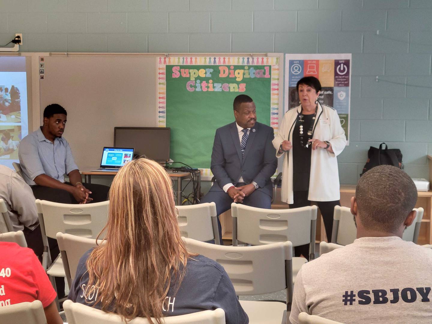 Superintendent Darryl Williams, left, and Deborah Phelps, executive director of The Education Foundation of Baltimore County Public Schools, addresses an audience at the system's first Partnership Fair on Wednesday.