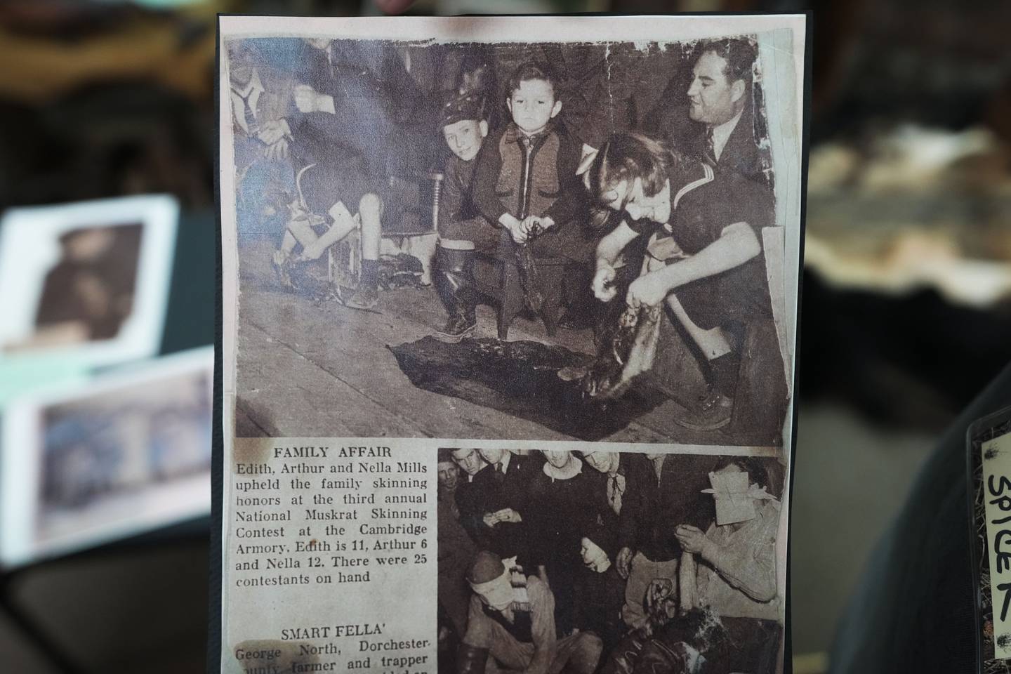 A newspaper clipping fromThe Baltimore Sun in 1938 shows Nellie Flowers skinning a muskrat in one of the first ever skinning competitions.