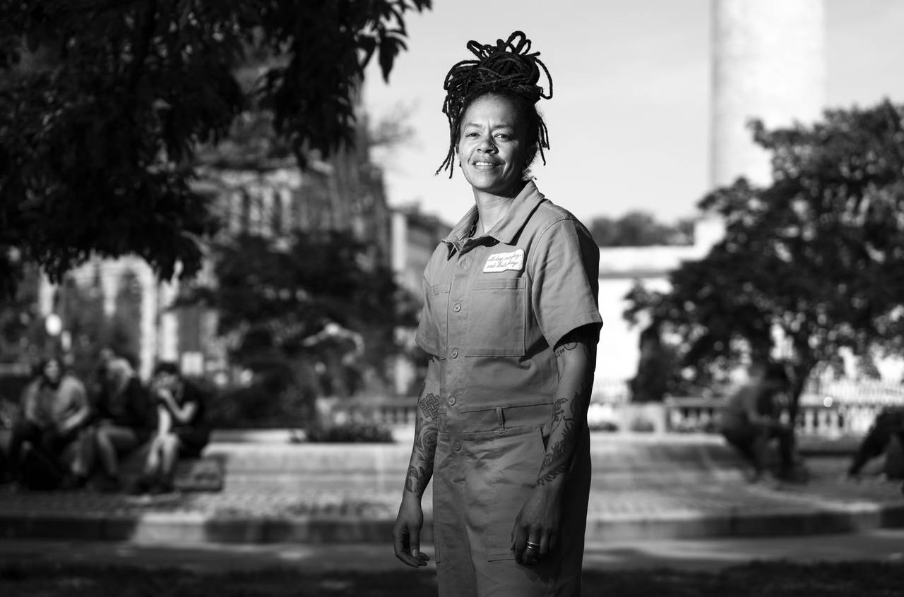 April Watkins, poses for a portrait around Mount Vernon, in Baltimore, Tuesday, May 30, 2023.
