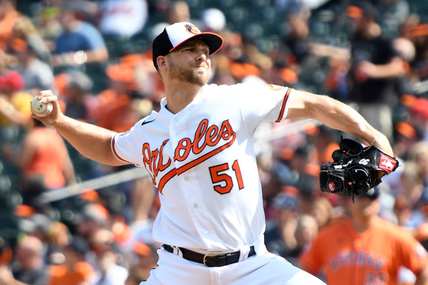 BALTIMORE, MD - SEPTEMBER 25:  Austin Voth #51 of the Baltimore Orioles pitches in the first inning during a baseball game against the Houston Astros at Oriole Park at Camden Yards on September 25, 2022 in Baltimore, Maryland.