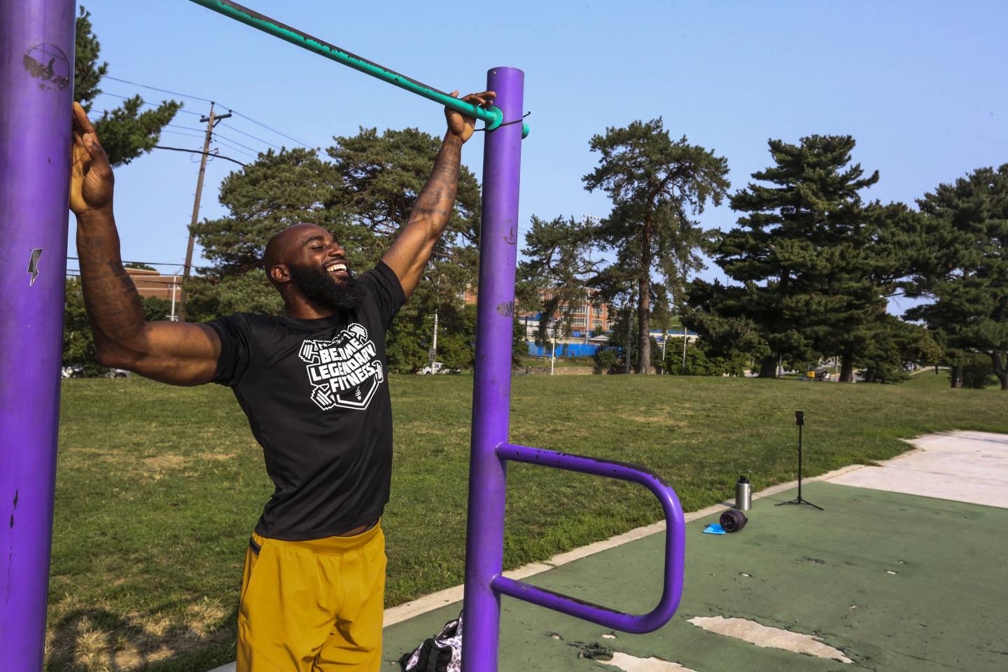 Marcus Hatten, a former basketball player, has been coaching workout classes in the park at Lake Montebello that have attracted a large and dedicted following.