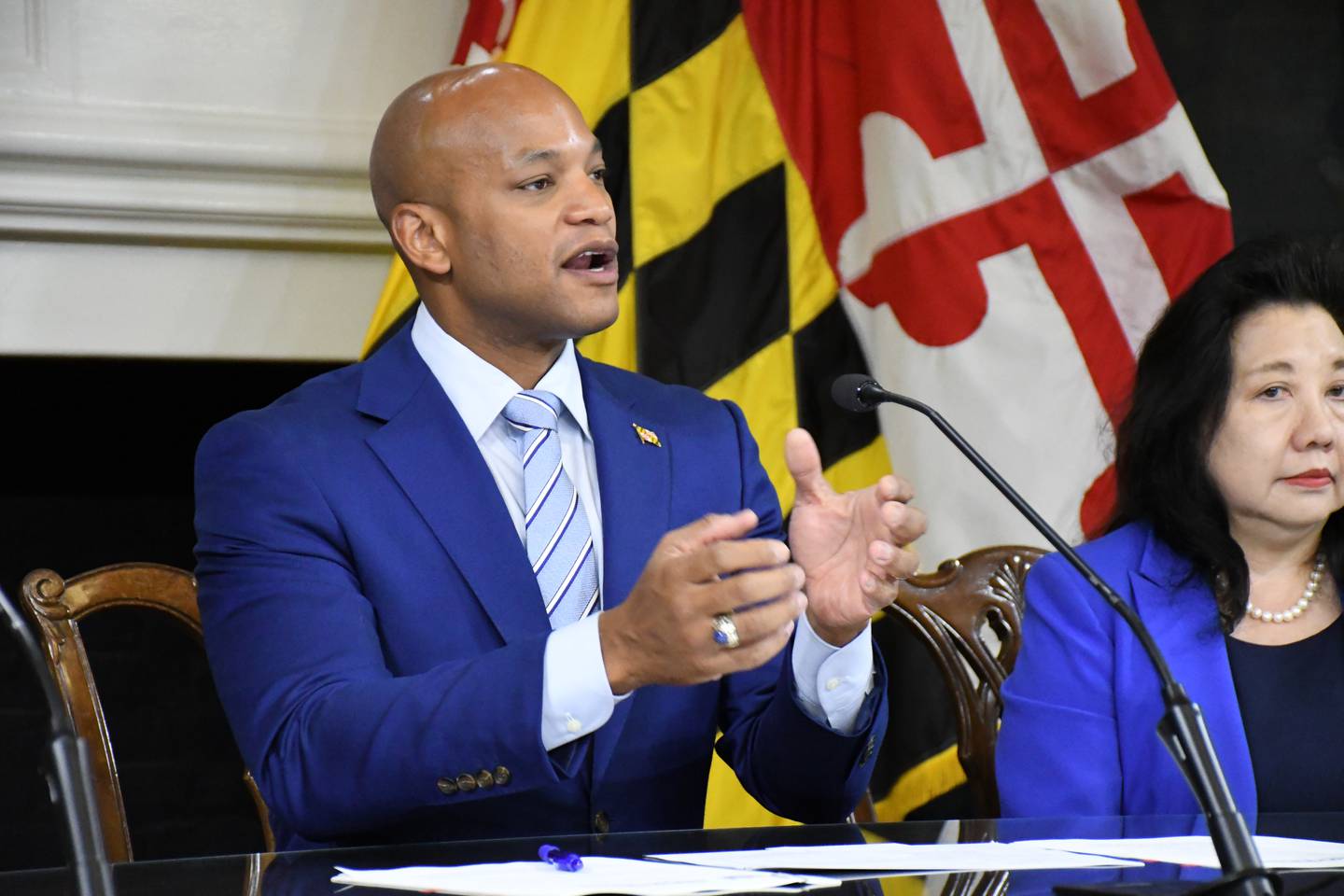 Maryland Gov. Wes Moore holds his first press conference in the Governors Reception Room at the State House in Annapolis on Thursday, Jan. 19, 2023. Sitting next to him is his nominee for secretary of state, Susan Lee.