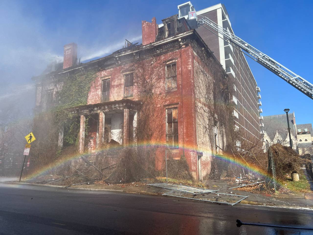 Firefighters battle a three-alarm blaze at the 1868 Sellers Mansion in Baltimore on Feb. 24, 2023.