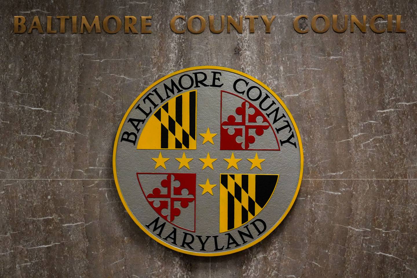 6/16/22—Signs reading “Baltimore County Maryland” and “Baltimore County Council” hang on the wall inside the historic Baltimore County Courthouse in Towson, the center of county government.