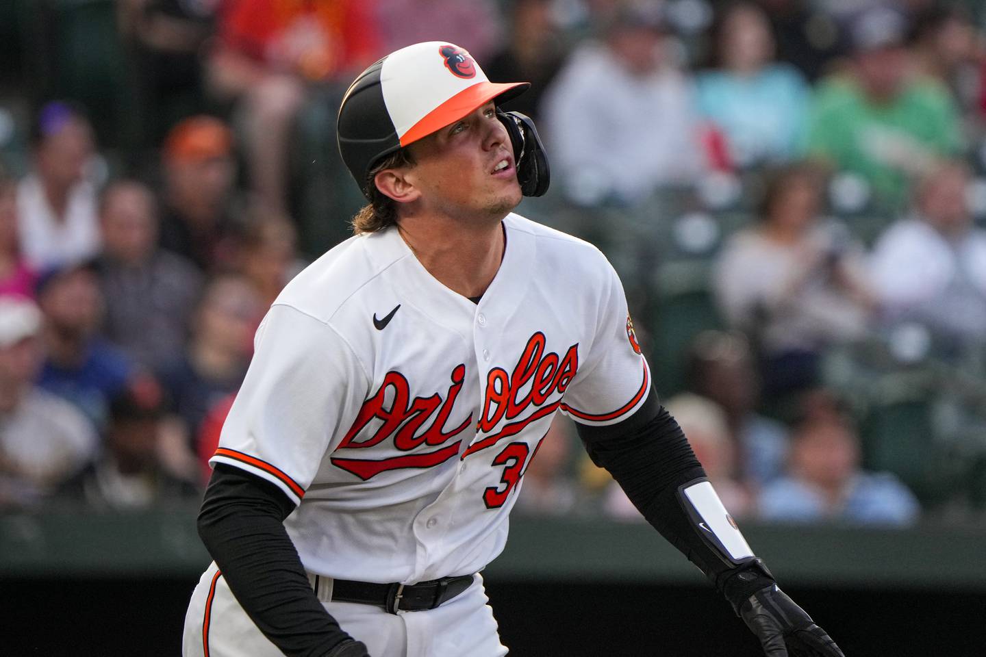 Baltimore Orioles catcher Adley Rutschman (35) looks up at the ball after singling in a baseball game against the Oakland Athletics at Camden Yards on Tuesday, April 11. The Orioles beat the Athletics, 12-8, in the second game of the series.