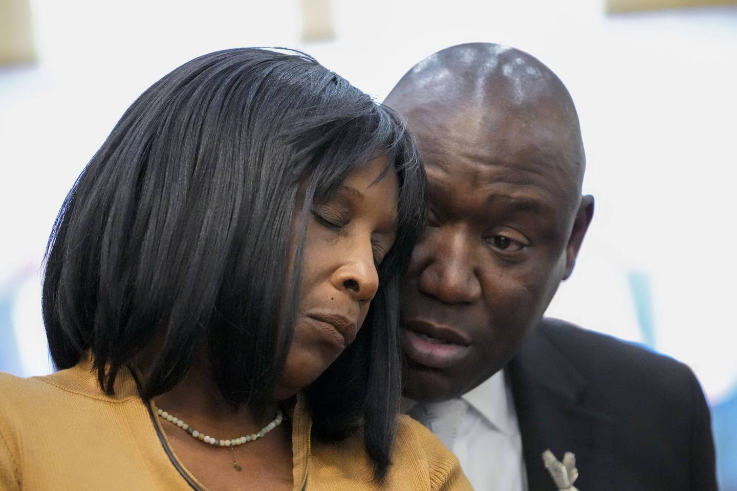 Civil rights Attorney Ben Crump speaks to RowVaughn Wells, mother of Tyre Nichols, who died after being beaten by Memphis police officers, at a news conference with in Memphis, Tenn., Friday, Jan. 27, 2023.