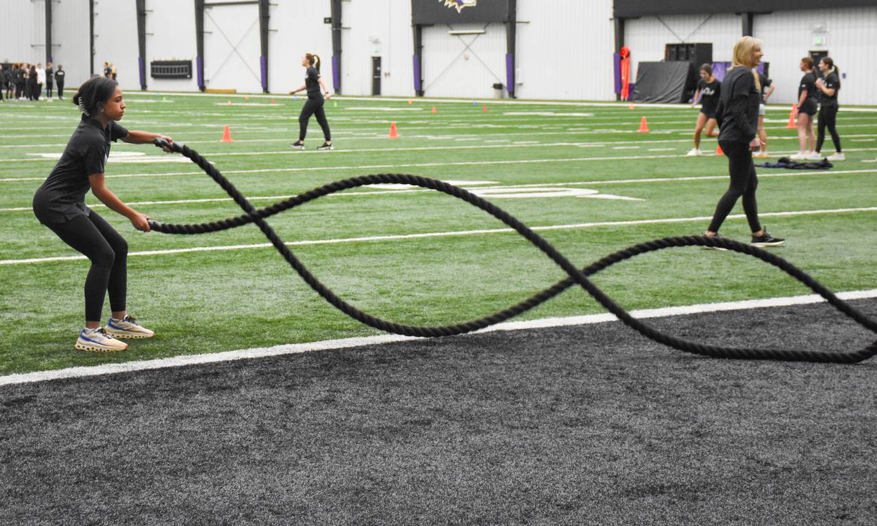 One of the attendees of the Ravens LIFT Conference participates in a rope drill led by female Ravens staff members in Owings Mills on Thursday, April 4, 2024.