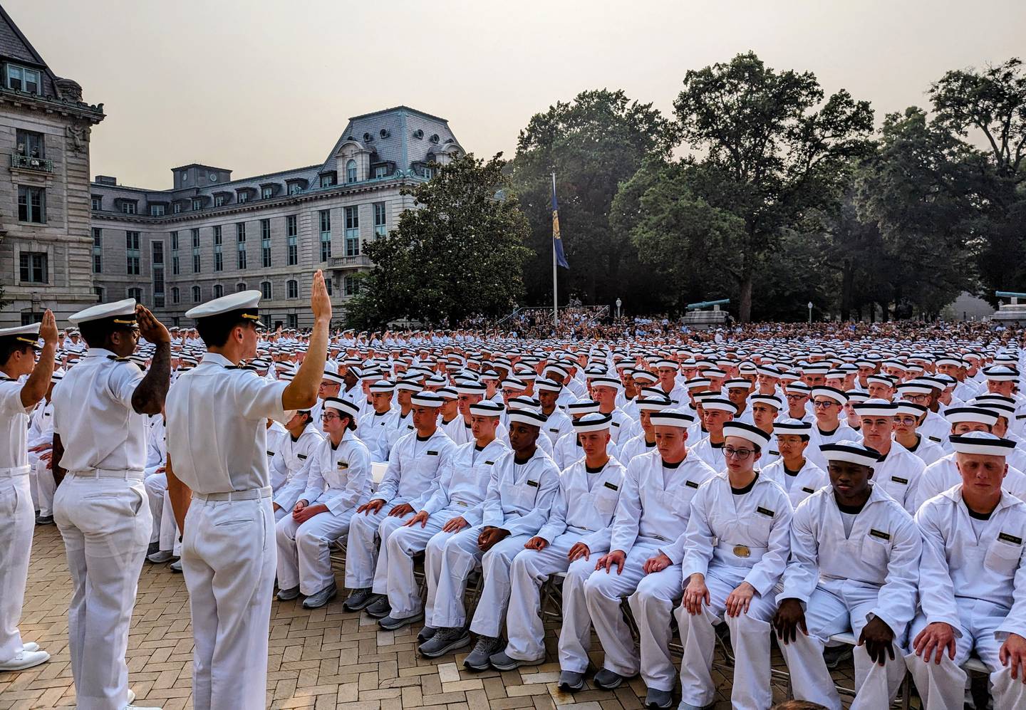 Naval Academy upper-class midshipmen take an oath as they prepare to lead plebes through their first summer.  A new Pentagon report found that better training and support for peer leaders may help reduce sexual assaults at the service academies.
