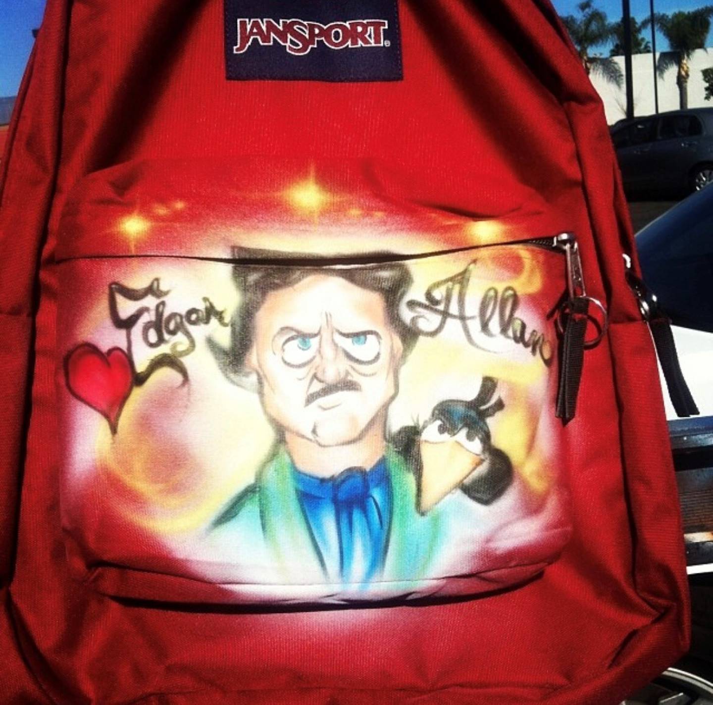 After connecting with an artist online, reporter Jasmine Vaughn-Hall drove to Long Beach, California to get Edgar Allan Poe airbrushed onto her Jansport backpack.