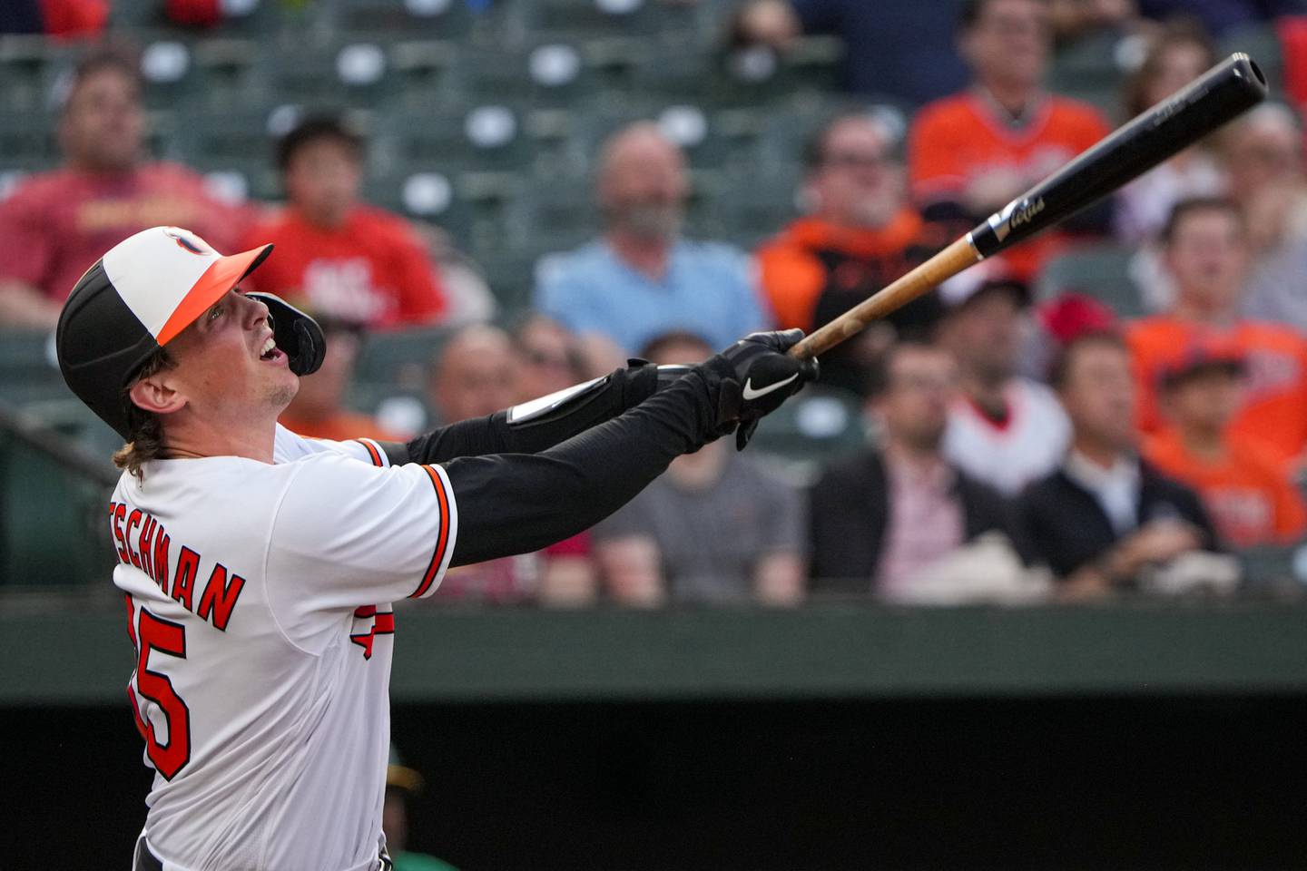 Baltimore Orioles catcher Adley Rutschman (35) swings in a baseball game against the Oakland Athletics at Camden Yards on Tuesday, April 11. The Orioles beat the Athletics, 12-8, in the second game of the series.