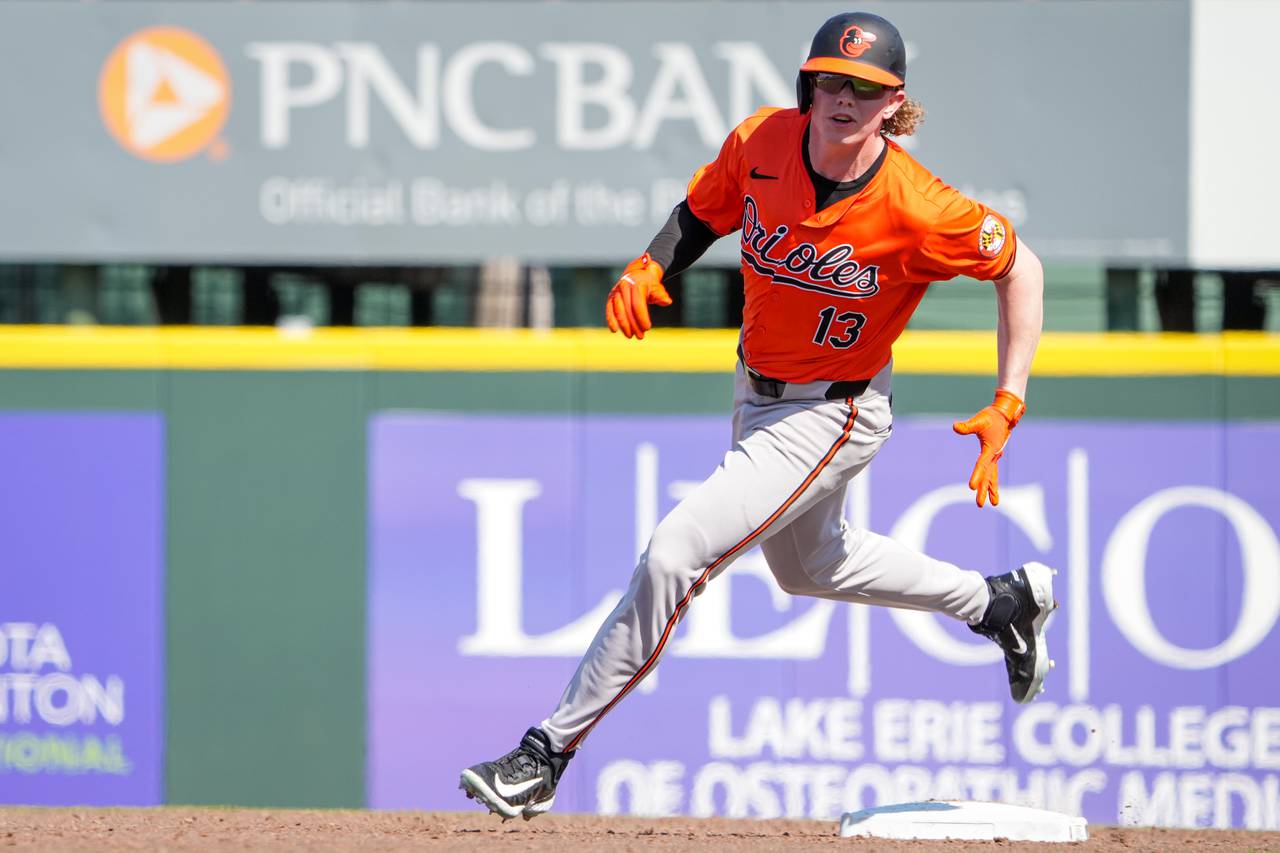 Baltimore Orioles right fielder Heston Kjerstad (13) runs to third base during a Grapefruit League game against the Pittsburgh Pirates at LECOM Park on February 25, 2024. The Orioles beat the Pirates, 2-0, during Sunday’s game.