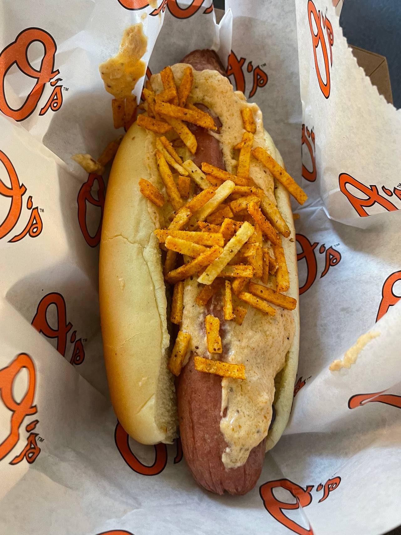 At a media preview, the Orioles and Levy Restaurants introduced a Yard Dog with three, footlong hot dogs topped with crab dip and potato sticks. The item was missing in action during a follow-up trip to the ballpark; in its place, the more down-to-earth Maryland Dog, which was a normal-sized hot dog topped with crab dip.
