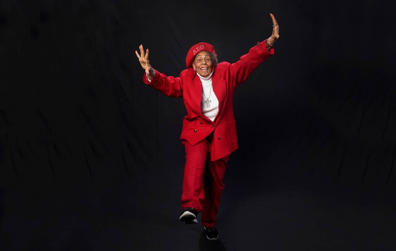 90 year-old Grace Bryant wear the Delta Sigma Theta's colors, crimson and cream.