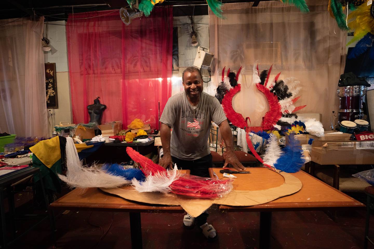Kenley John of Shortmus Productions, making costumes for the annual Baltimore Caribbean Carnival