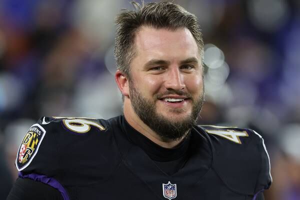 Ravens re-sign All-Pro long snapper Nick Moore to two-year deal
