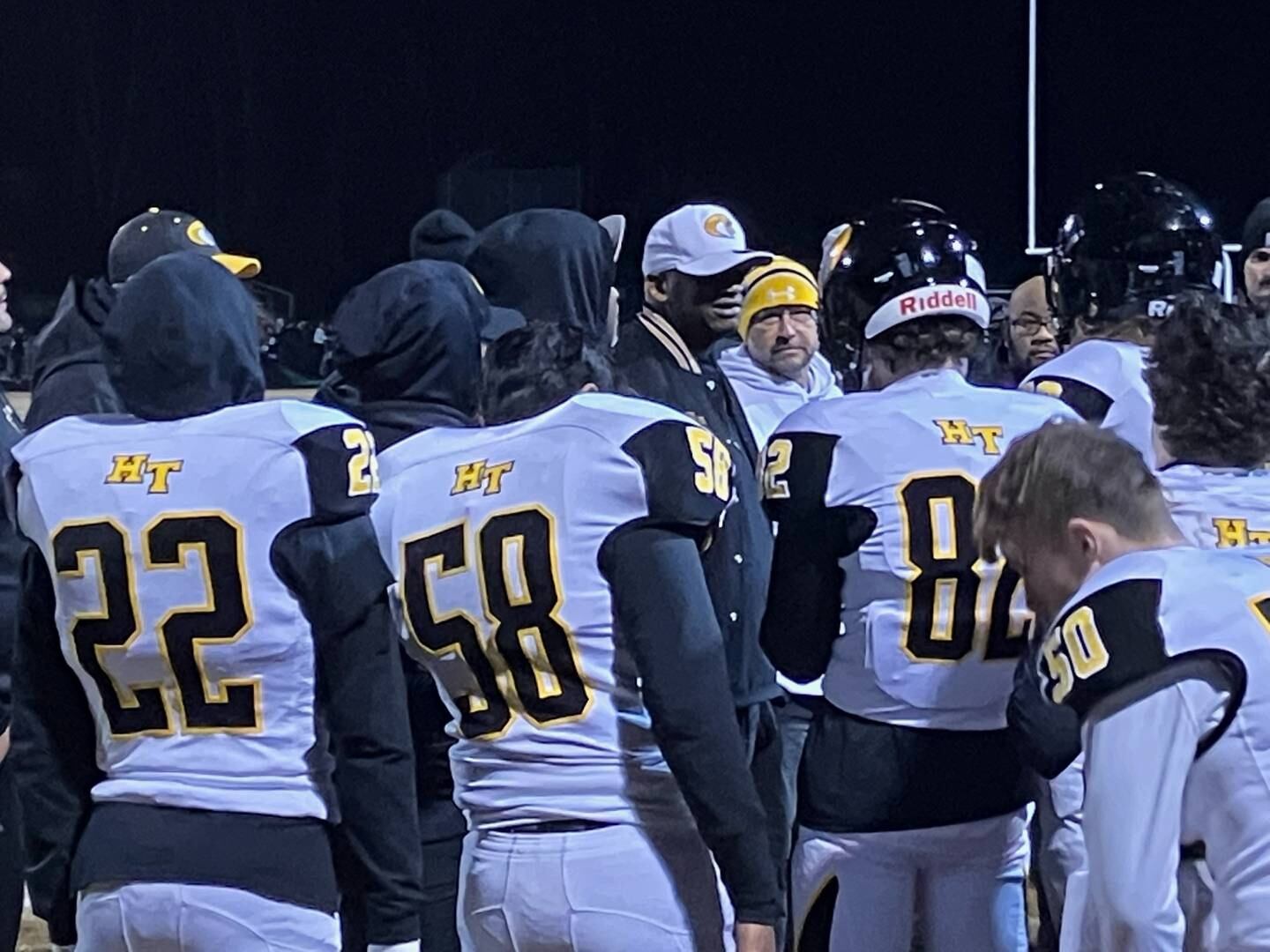Harford Tech football coach Tim Palmer (center) talks to his team after Friday night's Class 2A/1A state semifinal at Patuxent. The Cobras' late season surge fell short of a first state final as Patuxent won 43-21 in Calvert County.