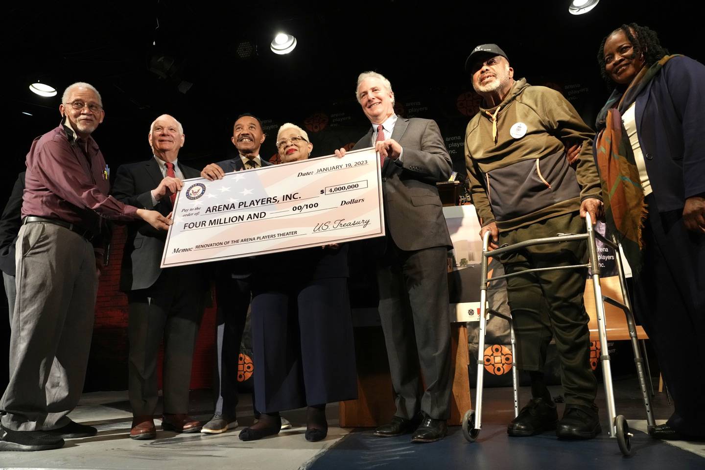 Senator Ben Cardin, US Representative Kweisi Mfume, Senator Chris Van Hollen and Senator Larry Young present a check from the US Treasury for four million dollars to the Arena Players, the oldest continually performing and historically African-American community theatre in the United States, on January 19, 2023.