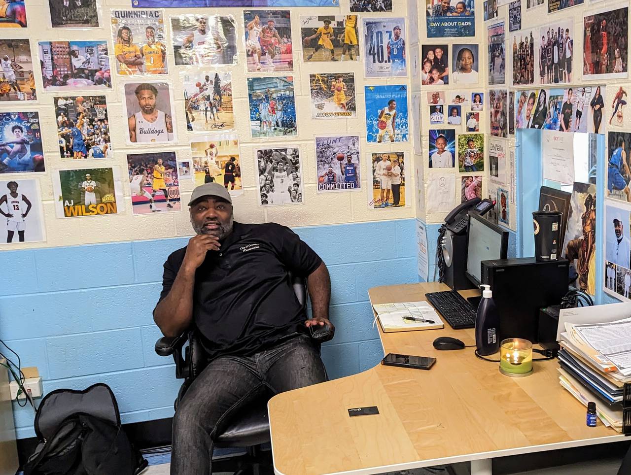 Brian Butler's office is surrounded by photos of kids who have come through the Springhill Lake Recreation Center. But they have to graduate from high school.