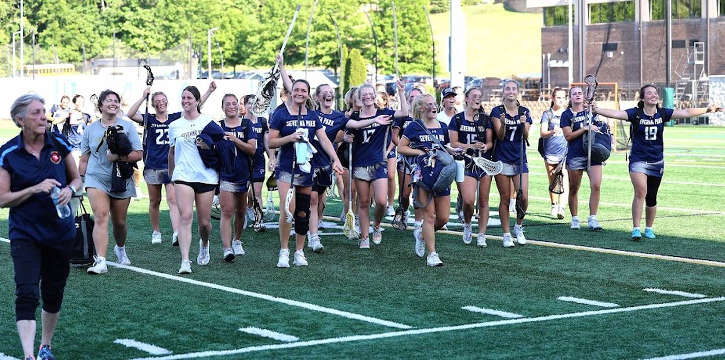 Severna Park's girls lacrosse team acknowledge their fans before the award ceremonies following Thursday's Class 3A state championship game. The No. 8 Falcons won their first state title since 2019 (4A) with a 12-8 victory over No. 11 Towson at Stevenson University.