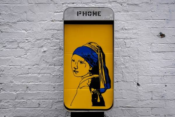 History calling: Baltimore artist adorns abandoned phone booths across the city
