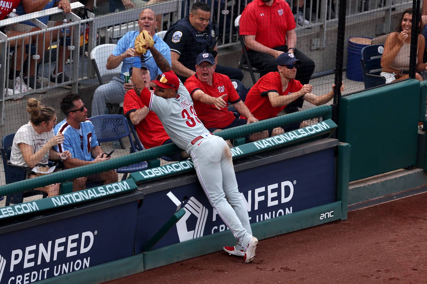 WASHINGTON, DC - JUNE 03: Edmundo Sosa #33 of the Philadelphia Phillies catches a foul ball hit by Dominic Smith #22 of the Washington Nationals for the third out of the sixth inning at Nationals Park on June 03, 2023 in Washington, DC.