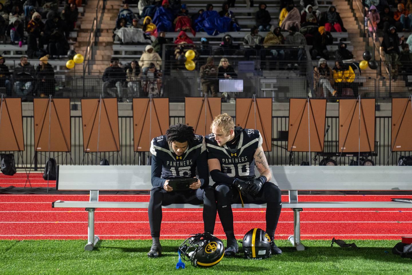 St. Frances wide receiver/defensive back Mason Beale, left, and senior tight end Chase Wilkens review plays of the game against Clarkson North at Under Armour Stadium on Friday, Nov. 10, 2023.