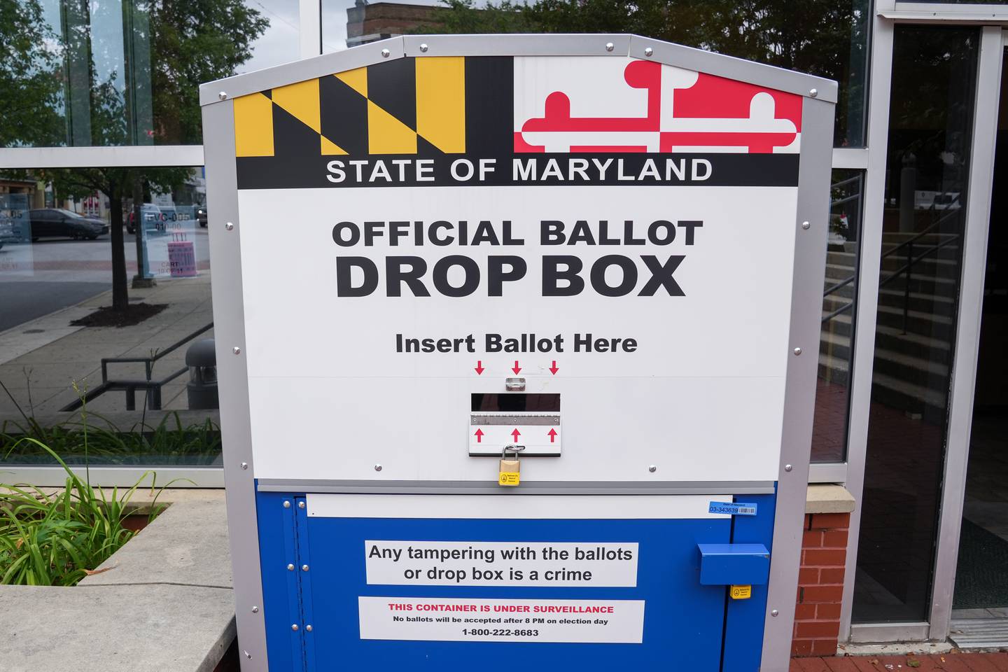7/7/22—A State of Maryland official ballot drop box sits outside the Southeast Anchor Branch of the Enoch Pratt Free Library on the first day of early voting in Maryland’s Primary Election.