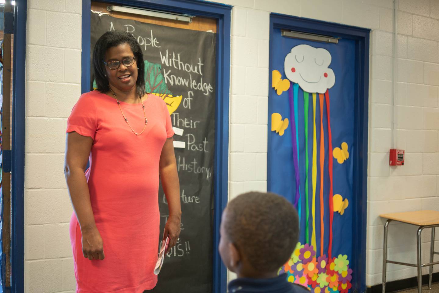 Baltimore City School CEO Sonja Santelises talks to student during a school tour.